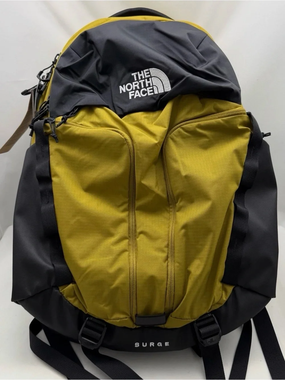 The North Face Surge Backpack - Deep Dijon/TNF Black